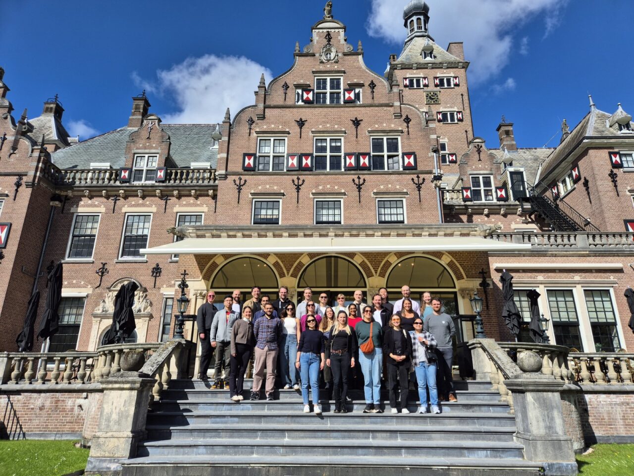 Scitaris team members standing in front of the Landgoed Duin & Kruidberg